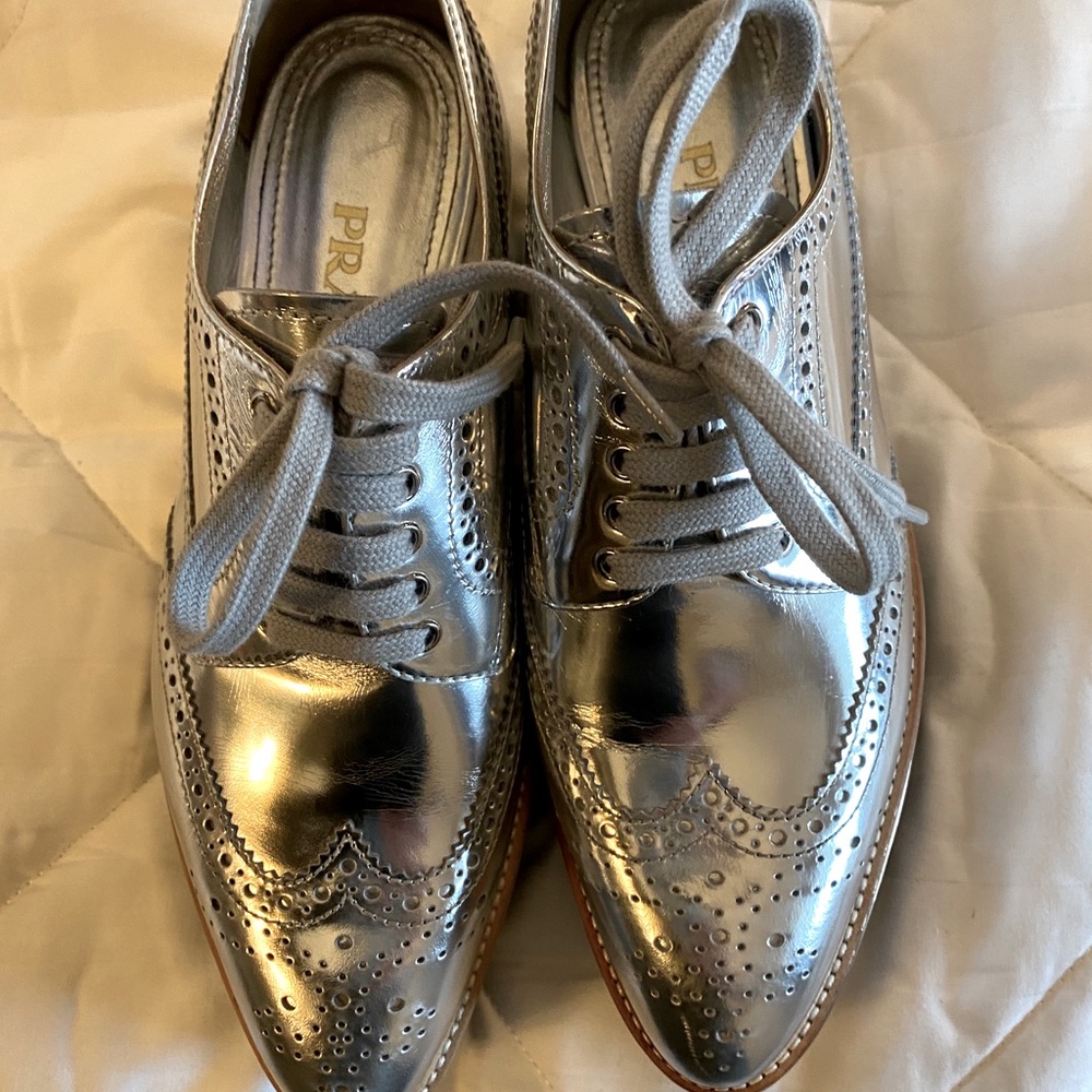 Silver Prada Wingtip Platform Shoes